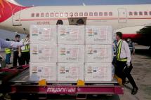 A handout photo made available by the India Embassy Yangon shows workers unloading boxes containing COVID-19 vaccine from India for Myanmar, at Yangon International Airport, in Yangon, Myanmar, 22 January 2021. Photo: India Embassy Yangon/EPA