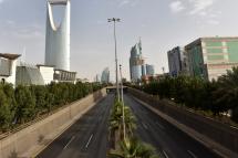 A picture taken on March 26, 2020, shows the main King Fahd road empty in the Saudi capital Riyadh, after the Kingdom began implementing an 11-hour nationwide curfew, on the day of an emergency G20 videoconference, to discuss a response to the COVID-19 crisis. Photo: AFP