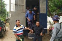 Being brought to court. Photo: Phone Naing Phyo