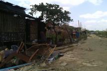 The pressure is on to evict the slum dwellers. Photo: Mizzima
