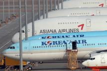 Planes of South Korea's top flag carrier Korean Air Lines and carrier Asiana Airlines Inc. are parked at Incheon International Airport in Incheon, South Korea, 16 November 2020. Photo: EPA