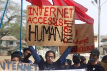 Rakhine University Students hold placards during a protest against the internet shutdown in Sittwe, Rakhine State, Western Myanmar, 22 February 2020. Photo: Nyunt Win/EPA