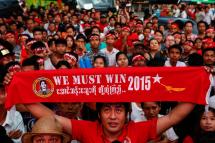 Supporters of National League for Democracy (NLD) party celebrate in front of the NLD headquarters a day after general elections in Yangon, Myanmar, 09 November 2015. Photo: Lynn Bo Bo/Mizzima
