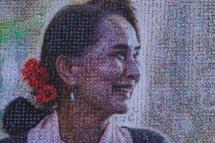 A large mosaic-like combo-picture of Myanmar State Counsellor Aung San Suu Kyi made from portraits of 7,500 supporters holding wish placards on the day ahead of her 75th birthday in Yangon, Myanmar, 18 June 2020. Photo: Lynn Bo Bo/EPA