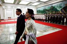 Chinese Premier Li Keqiang (L) and Myanmar State Counsellor Aung San Suu Kyi (C) walk past People's Liberation Army honor guards during a welcome ceremony at the Great Hall of the People in Beijing, China, 18 August 2016. Photo: Rolex Dela Pena/EPA
