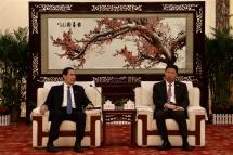 A handout photo made available by Ma Yung-jeou's office shows Taiwan former president Ma Ying-jeou (L) meet with Song Tao (R), Director of China's Taiwan Affairs Office, during his visit in Wuhan, China, 30 March 2023. Photo: EPA