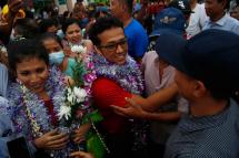 Arakan Army (AA) Commander-in-Chief's sister Hnin Pwint Phru (L) and brother arrive at Sittwe Airport after being released from Rangoon Western District Court, Rakhine State, Western Myanmar, 09 June 2021. Photo: EPA