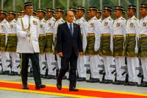 President U Thein Sein inspects an honour guard during a welcoming ceremony at Parliament House in Kuala Lumpur on March 12 at the start of a two-day state visit to Malaysia. U Thein Sein’s discussions with the Malaysian Prime Minister, Mr Najib Razak, would involve bilateral issues and matters of regional concern, the Malaysian government said. Malaysia this year holds the rotating chairmanship of the 10-member Association of Southeast Asian Nations. Photo: Azhar Rahim/EPA
