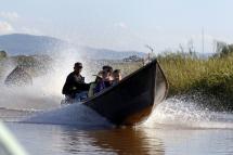 Tourists being transported across Inlay Lake, Nyaungshwe Township, Taunggyi, Shan State. Photo: Nyein Chan Naing/EPA
