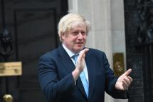Britain's Prime Minister Boris Johnson takes part in the 'Clap For Our Carers' initiative in support of the National Health Service (NHS) in Downing Street in London, Britain, 21 May 2020. Photo: EPA