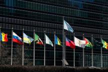 The United Nations flag is seen over countries flags outside the United Nations Headquarters in New York, New York, USA, 04 February 2021. Photo: EPA