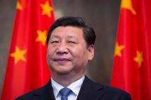  China's President Xi Jinping stands by national flags at the Schloss Bellevue presidential residency in Berlin. Xi Jinping secured a historic third term as China's leader on October 23, 2022 and promoted some of his closest Communist Party allies, cementing his position as the nation's most powerful leader since Mao Zedong. Photo: AFP