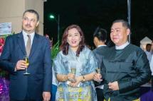 Aung Hlaing Oo (right), who runs MCM, a private arms brokerage firm for the Myanmar military, is seen with the Ukrainian ambassador to Myanmar (left) in 2017. Photo: Myanmar Now