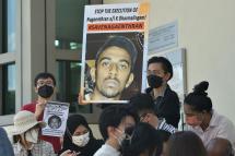 Activists hold posters against the execution of Nagaenthran K. Dharmalingam, sentenced to death for trafficking heroin into Singapore, outside the Singapore High Commision in Kuala Lumpur on March 9, 2022. Photo: AFP
