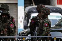 Soldiers patrol Yangon in February 2021. Photo: EPA