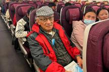 French serial killer Charles Sobhraj (C) sits in an aircraft departing from Kathmandu to France, on December 23, 2022. Photo: AFP
