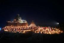 People take part in the Tazaungdaing festival, also known as the festival of lights, at the pagoda in Mrauk U in Myanmar's Rakhine state on Nov. 18. (Photo: AFP)