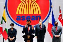 This handout photograph taken on April 24, 2021 and released by the Indonesian Presidential Palace shows Indonesian President Joko Widodo (center) adjusts his facemask while delivering his speech at the Association of Southeast Asian Nations (ASEAN), Myannmar crisis talks in Jakarta. Photo: AFP