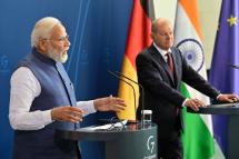 German Chancellor Olaf Scholz (R) and Indian Prime Minister Narendra Modi (L) address a press conference following the Indo-German governmental consultations at the Chancellery in Berlin on May 2, 2022. Photo: AFP