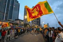 Anti-government demonstrators take part in a protest near the President's office in Colombo. Photo: AFP