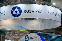 A picture taken on June 28, 2016 shows the logo of Russian atomic energy agency Rosatom during the World Nuclear Exhibition in Le Bourget, near Paris. (Photo by ERIC PIERMONT / AFP)