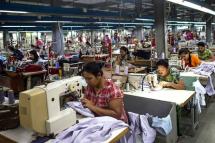 This file photo shows workers at a garment factory in Yangon. Photo: AFP