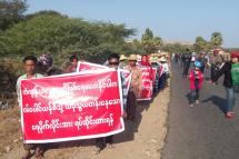 Villagers march along a road during a protest against a Chinese-backed copper mining company in Salingyi township, Sagaing region on December 30, 2019. Photo: Tint Aung Soe/Facebook