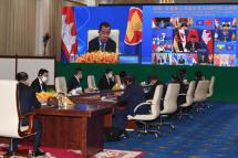  A handout photo made available by National Television of Cambodia shows Cambodian Prime Minister Hun Sen (L) attending a virtual meeting with leaders from China and the Association of Southeast Asian Nations (ASEAN), excluding Myanmar, during the ASEAN-China Summit at the Peace Palace in Phnom Penh, Cambodia, 22 November 2021.