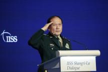 China’s Minister of National Defense Wei Fenghe salutes, during the fifth plenary session of the International Institute for Strategic Studies (IISS) Shangri-la Dialogue at the Shangri-la hotel in Singapore, 12 June 2022. Photo: EPA