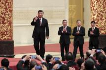 Chinese President Xi Jinping (L) leads the new members of the Standing Committee of the Political Bureau of the 20th Chinese Communist Party (CPC) Central Committee, Li Qiang (2-L), Zhao Leji (2-R), and Wang Huning (R) at a press conference at the Great Hall of People in Beijing, China, 23 October 2022. Photo: EPA