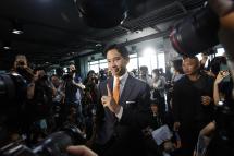 Move Forward Party's leader and prime ministerial candidate Pita Limjaroenrat poses for photos as a press conference after leading the vote count of the general elections at the party's headquarters in Bangkok, Thailand, 15 May 2023. Photo: EPA