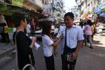 White armband campaign gets underway in Yangon March 13, 2015. Photo: Hein Htet/Mizzima
