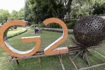 A G20 logo, part of an art installation made of scrap metal, is seen at a waste-to-art themed park marking the upcoming G20 summit, in Chanakyapuri, New Delhi, India, 22 June 2023. Photo: EPA