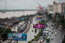 A general view of the Yangon river port is seen past a main road in Yangon. Photo: Ye Aung Thu/AFP
